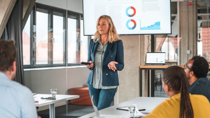 Woman discussing data-driven recruitment in a conference room