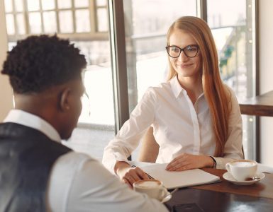 Job applicant being asked behavioral interview questions by an interviewer